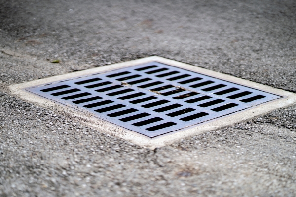 Square outdoor drain in concrete surface